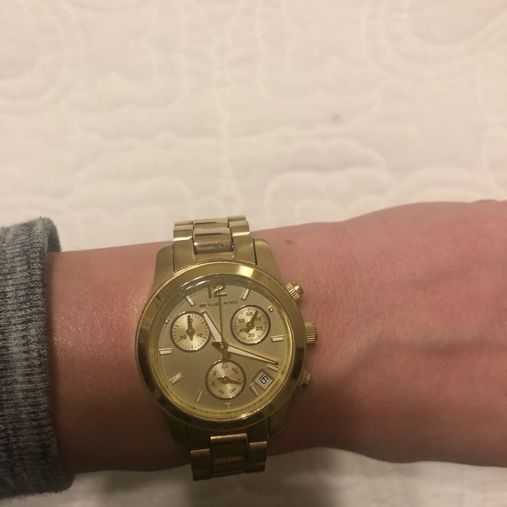 Michael Kors women’s gold watch